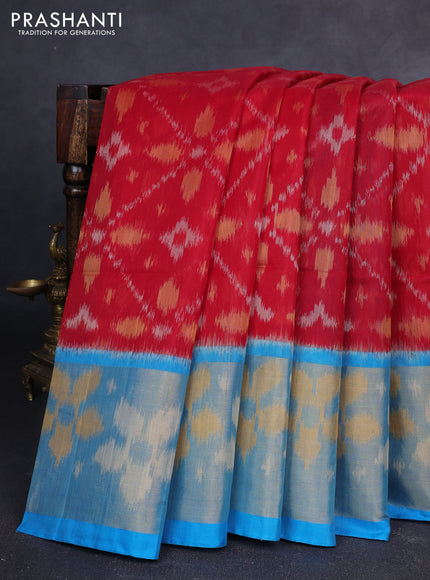 Ikat silk cotton saree kumkum red and cs blue with allover ikat weaves and long zari woven ikat border