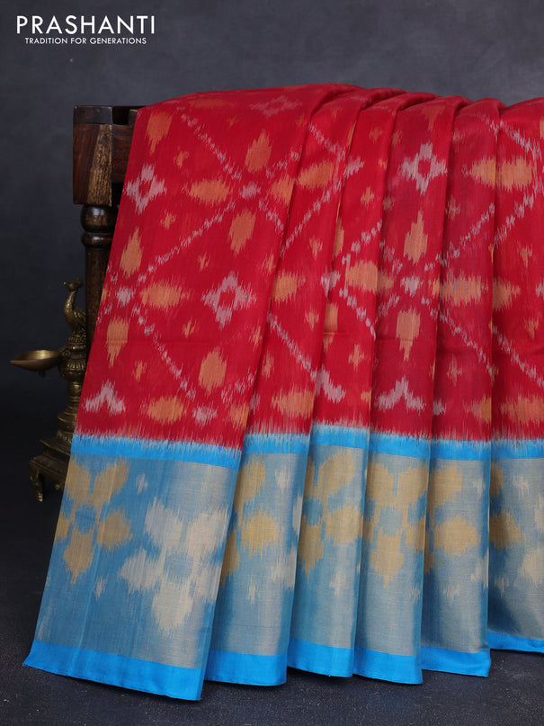 Ikat silk cotton saree kumkum red and cs blue with allover ikat weaves and long zari woven ikat border