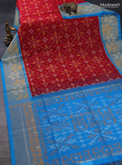 Ikat silk cotton saree kumkum red and cs blue with allover ikat weaves and long zari woven ikat border