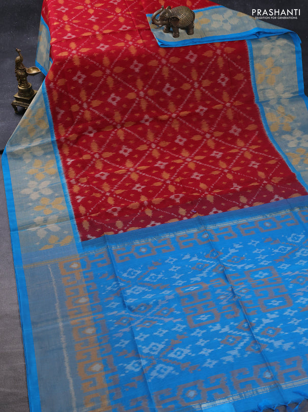 Ikat silk cotton saree kumkum red and cs blue with allover ikat weaves and long zari woven ikat border