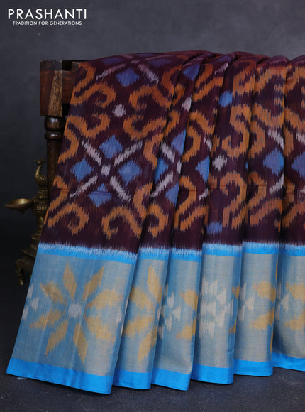 Ikat silk cotton saree deep wine and cs blue with allover ikat weaves and long zari woven ikat border
