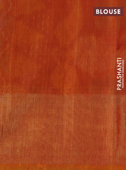 Ikat silk cotton saree blue and rustic orange with allover ikat weaves and long zari woven ikat border