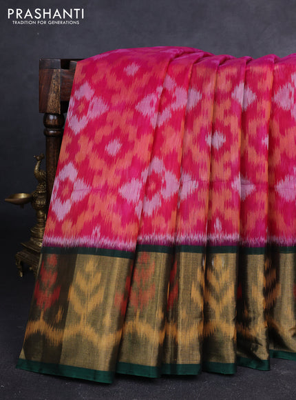 Ikat silk cotton saree pink and bottle green with allover ikat weaves and long zari woven ikat border