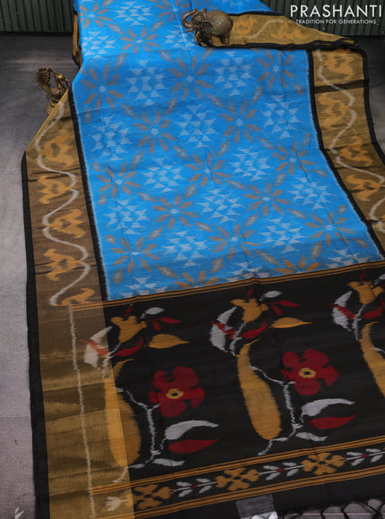 Ikat silk cotton saree light blue and black with allover ikat weaves and long zari woven ikat border