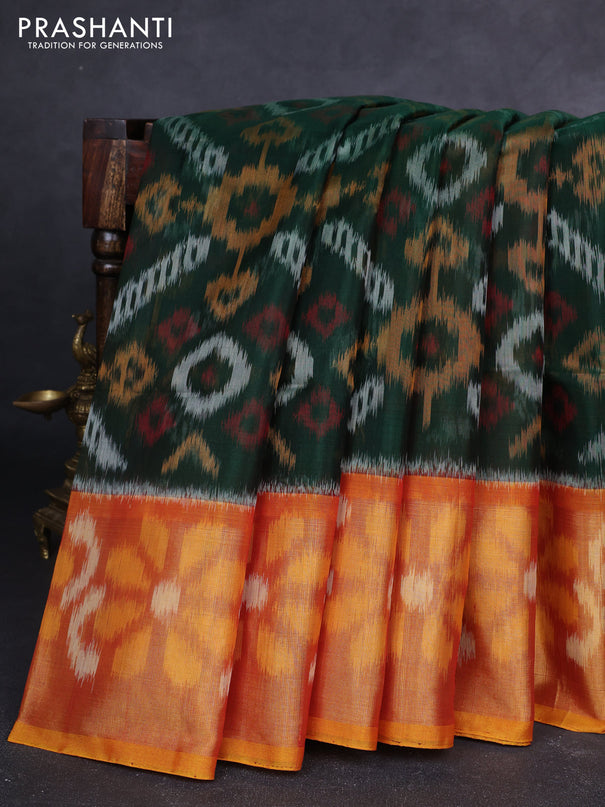 Ikat silk cotton saree bottle green and rustic orange with allover ikat weaves and long zari woven ikat border