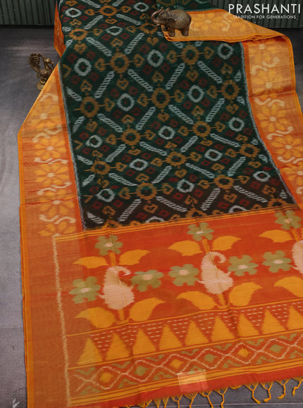 Ikat silk cotton saree bottle green and rustic orange with allover ikat weaves and long zari woven ikat border