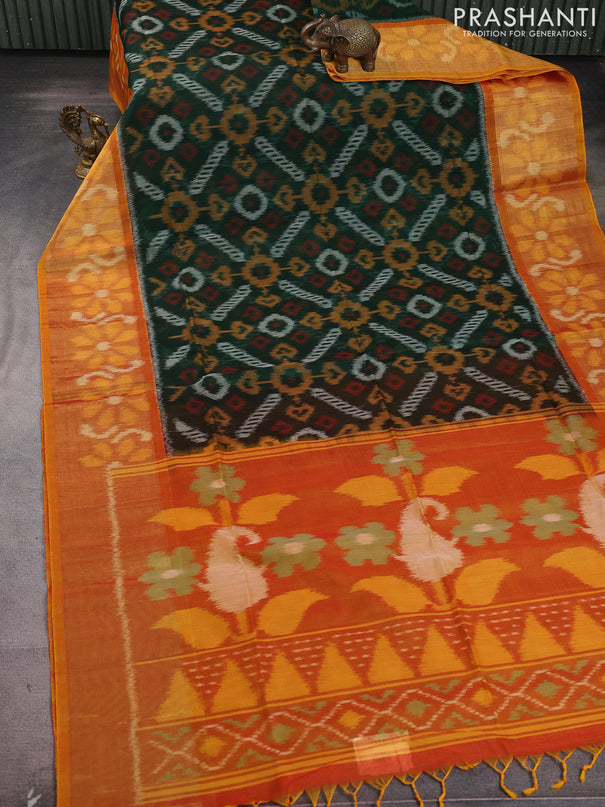 Ikat silk cotton saree bottle green and rustic orange with allover ikat weaves and long zari woven ikat border