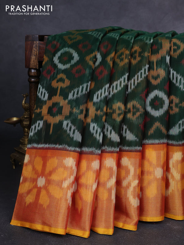 Ikat silk cotton saree bottle green and dual shade of dark mustard with allover ikat weaves and long zari woven ikat border