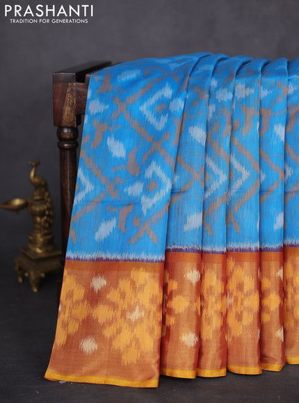 Ikat silk cotton saree light blue and dark mustard with allover ikat weaves and long zari woven ikat border