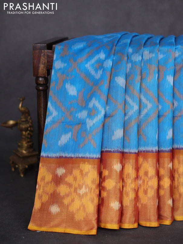 Ikat silk cotton saree light blue and dark mustard with allover ikat weaves and long zari woven ikat border