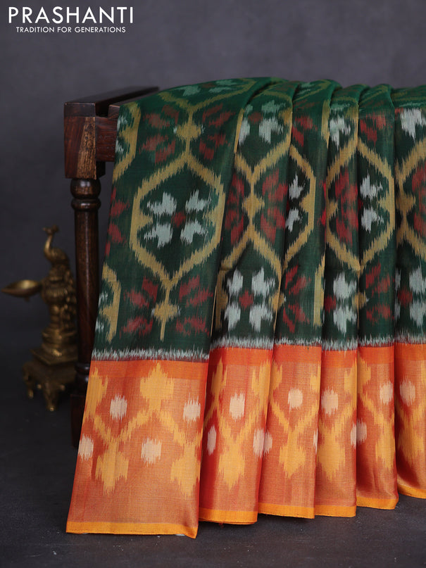 Ikat silk cotton saree bottle green and dual shade of dark mustard with allover ikat weaves and long zari woven ikat border