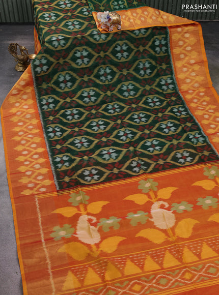 Ikat silk cotton saree bottle green and dual shade of dark mustard with allover ikat weaves and long zari woven ikat border