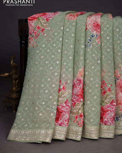 Georgette saree pastel green with allover sequin work & floral digital prints and sequin work border