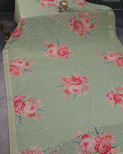 Georgette saree pastel green with allover sequin work & floral digital prints and sequin work border