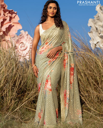 Georgette saree pastel green with allover sequin work & floral digital prints and sequin work border