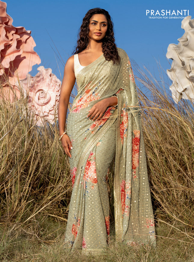 Georgette saree pastel green with allover sequin work & floral digital prints and sequin work border