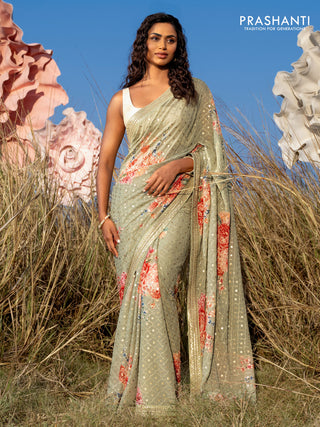 Georgette saree pastel green with allover sequin work & floral digital prints and sequin work border