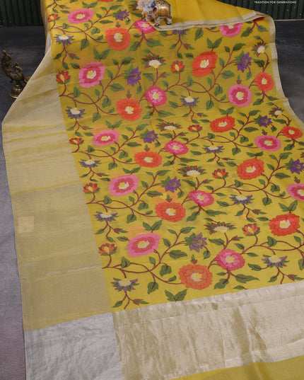 Organza silk saree yellow with allover floral embroidery work and long zari woven border