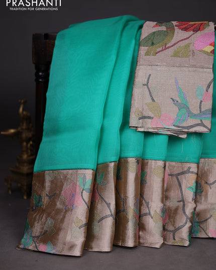 Organza silk saree teal green with plain body and embroidery border