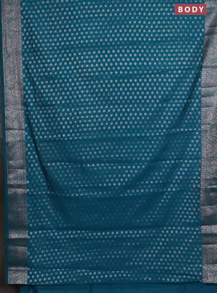 Banarasi semi chiniya saree teal green shade with allover thread & zari woven buttas and woven border