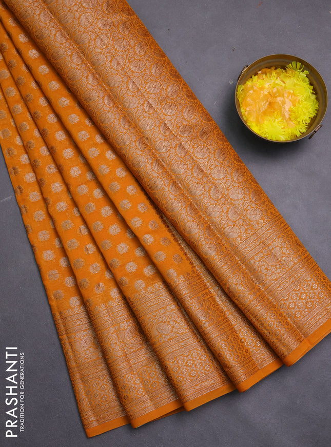 Banarasi semi chiniya saree orange shade with allover thread & zari woven buttas and woven border