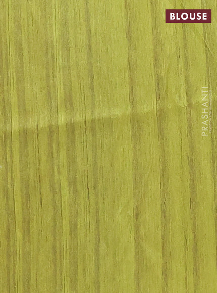 Semi tussar saree lime green and cream with butta prints and madhubani printed pallu & border