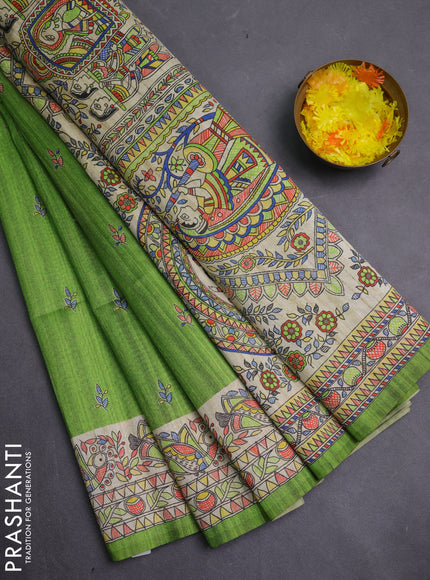 Semi tussar saree light green and beige with allover butta prints and madhubani printed pallu & border