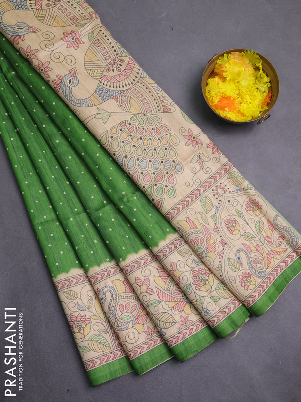 Semi tussar saree green and beige with allover butta prints and madhubani printed pallu & border