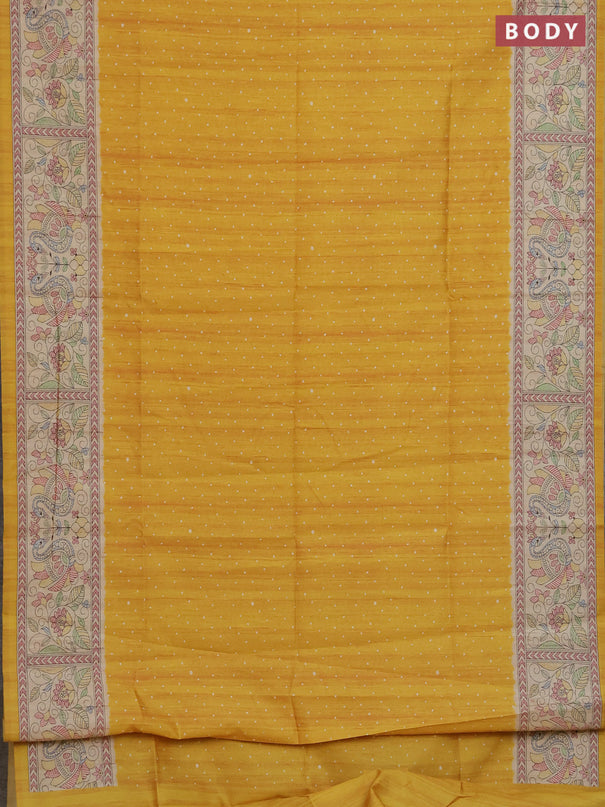 Semi tussar saree mustard yellow and cream with allover butta prints and madhubani printed pallu & border