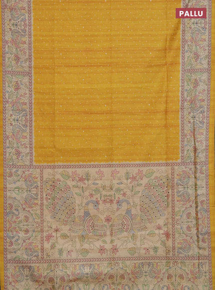 Semi tussar saree mustard yellow and cream with allover butta prints and madhubani printed pallu & border