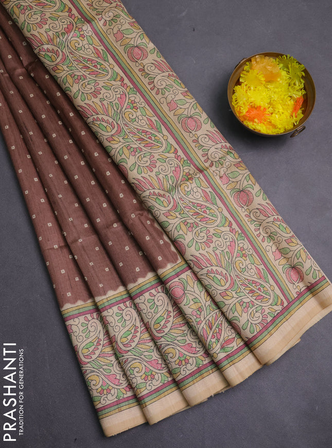 Semi tussar saree brown and cream with allover bandhani prints and madhubani printed pallu & border