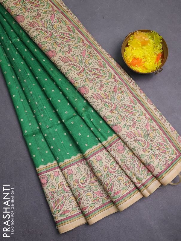 Semi tussar saree green and cream with allover bandhani prints and madhubani printed pallu & border