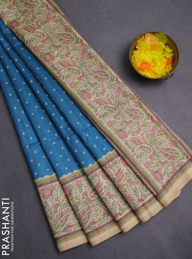 Semi tussar saree blue and cream with allover bandhani prints and madhubani printed pallu & border