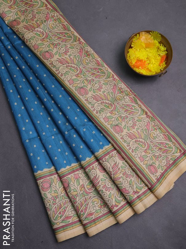 Semi tussar saree blue and cream with allover bandhani prints and madhubani printed pallu & border