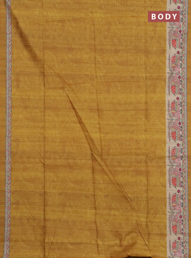 Semi tussar saree dark mustard and beige with allover prints and madhubani printed pallu & border