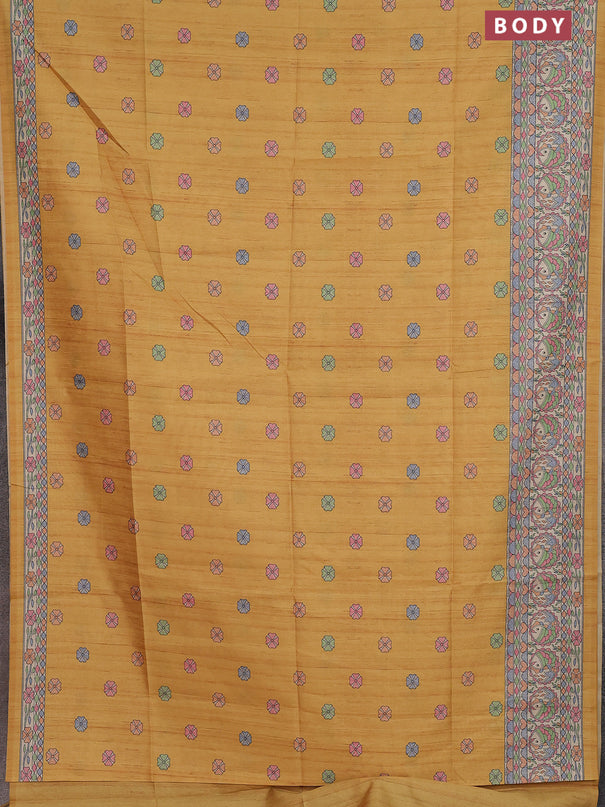 Semi tussar saree mustard yellow and beige with allover butta prints and madhubani printed pallu & border