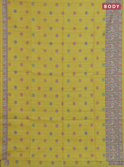 Semi tussar saree lime yellow and beige with allover butta prints and madhubani printed pallu & border