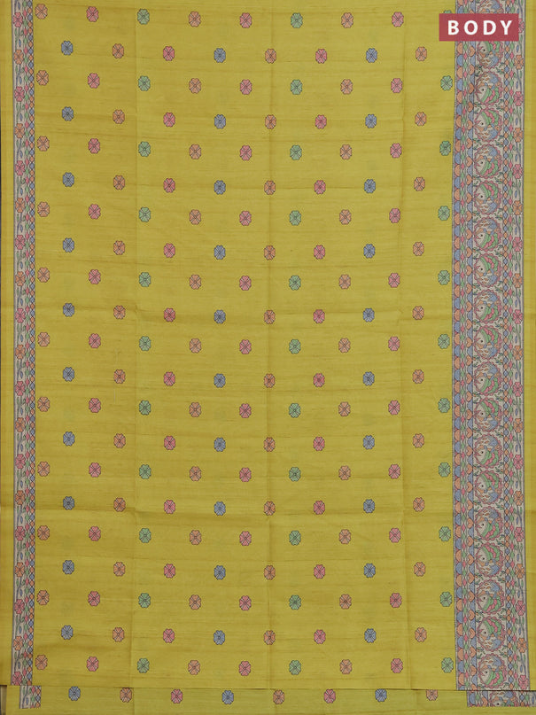 Semi tussar saree lime yellow and beige with allover butta prints and madhubani printed pallu & border