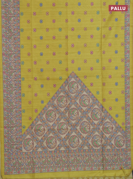 Semi tussar saree lime yellow and beige with allover butta prints and madhubani printed pallu & border