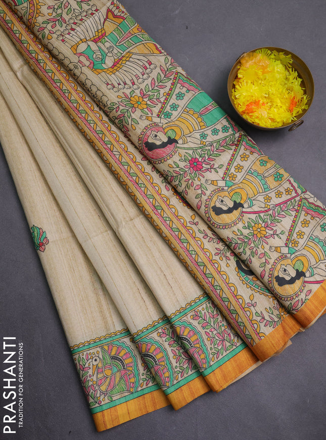 Semi tussar saree mustard yellow and cream with allover butta prints and madhubani printed pallu & border