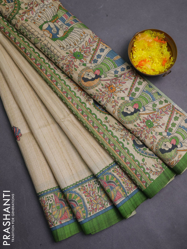 Semi tussar saree light green and cream with allover butta prints and madhubani printed pallu & border