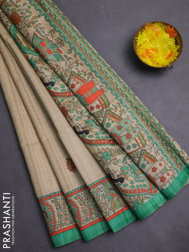 Semi tussar saree green and cream with allover butta prints and madhubani printed pallu & border