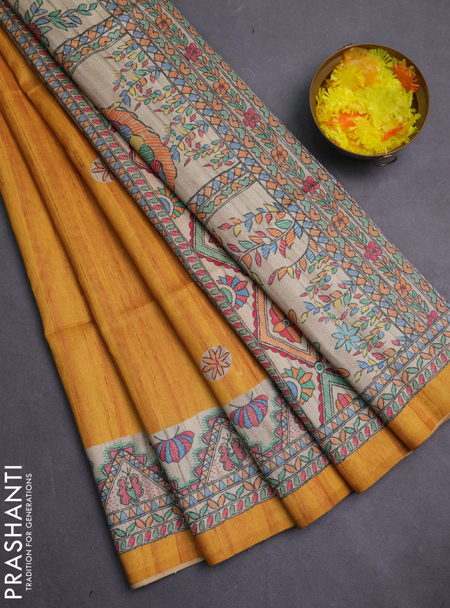 Semi tussar saree mustard yellow and cream with butta prints and madhubani printed pallu & border