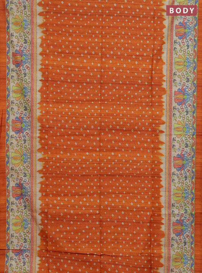 Semi tussar saree orange and beige with allover bandhani prints and madhubani printed pallu & border