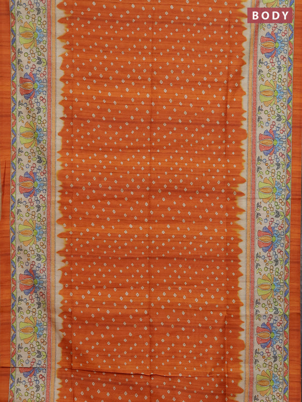 Semi tussar saree orange and beige with allover bandhani prints and madhubani printed pallu & border