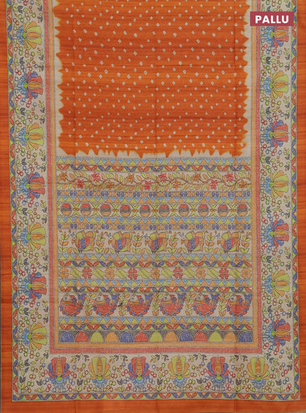 Semi tussar saree orange and beige with allover bandhani prints and madhubani printed pallu & border
