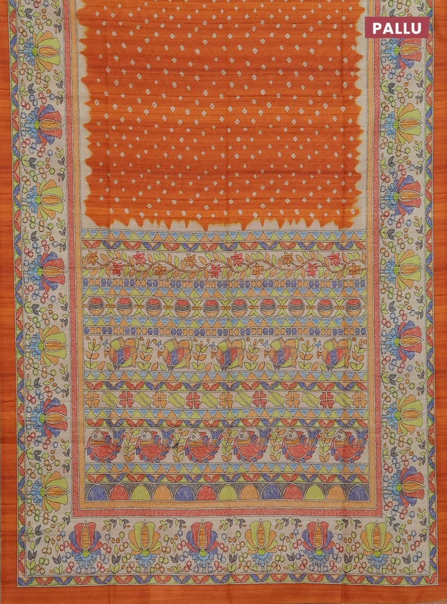 Semi tussar saree orange and beige with allover bandhani prints and madhubani printed pallu & border