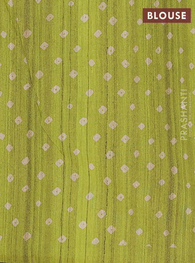 Semi tussar saree lime green and beige with allover bandhani prints and madhubani printed pallu & border