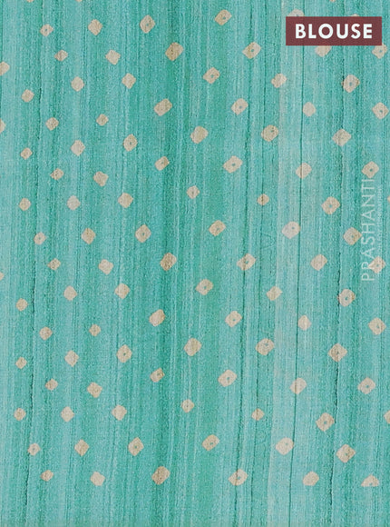 Semi tussar saree green and beige with allover bandhani prints and madhubani printed pallu & border