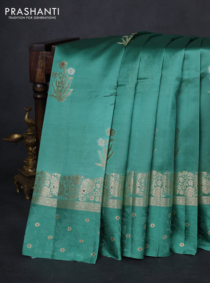 Poona silk saree teal green with floral zari woven buttas and zari woven self emboss border